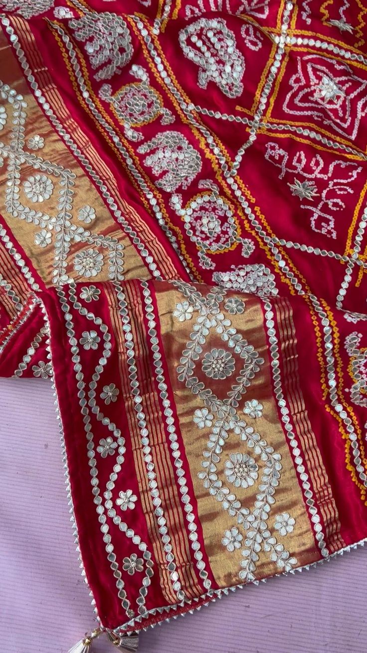 Red Bandhani dupattas in gaji silk with gotapatti work